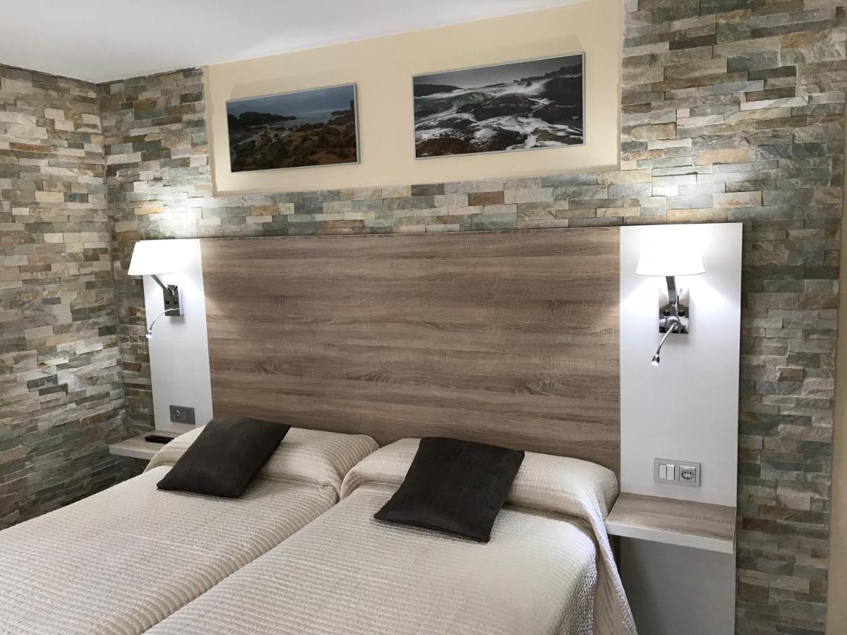 Residencial Santamaria Hotel Sancibrián Buitenkant foto