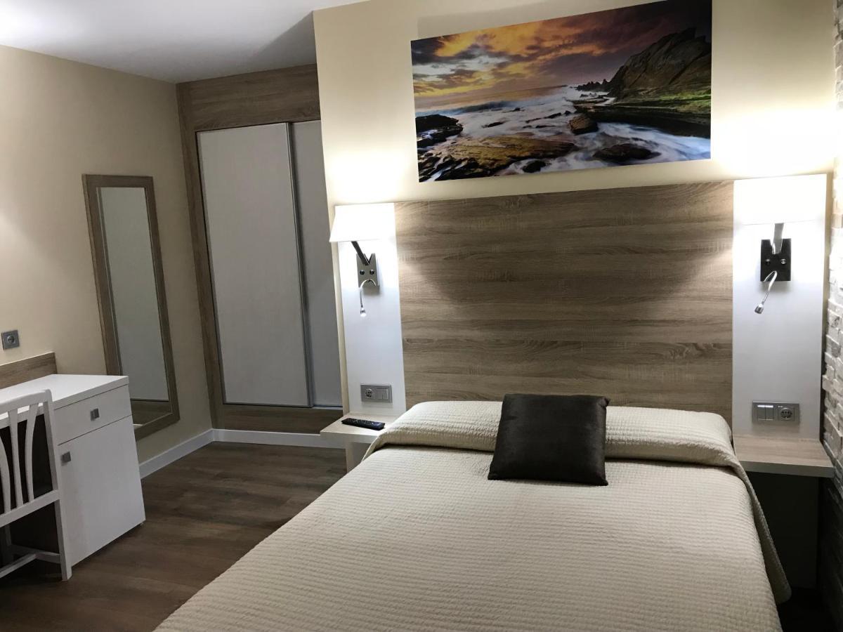 Residencial Santamaria Hotel Sancibrián Buitenkant foto